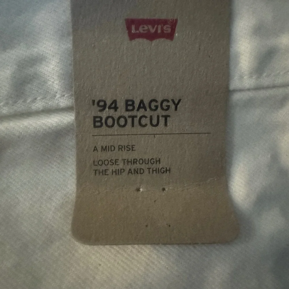 NWT Levis 94 Baggy Stretch Bootcut Jeans Womens 34x31 Off White Mid Rise Denim